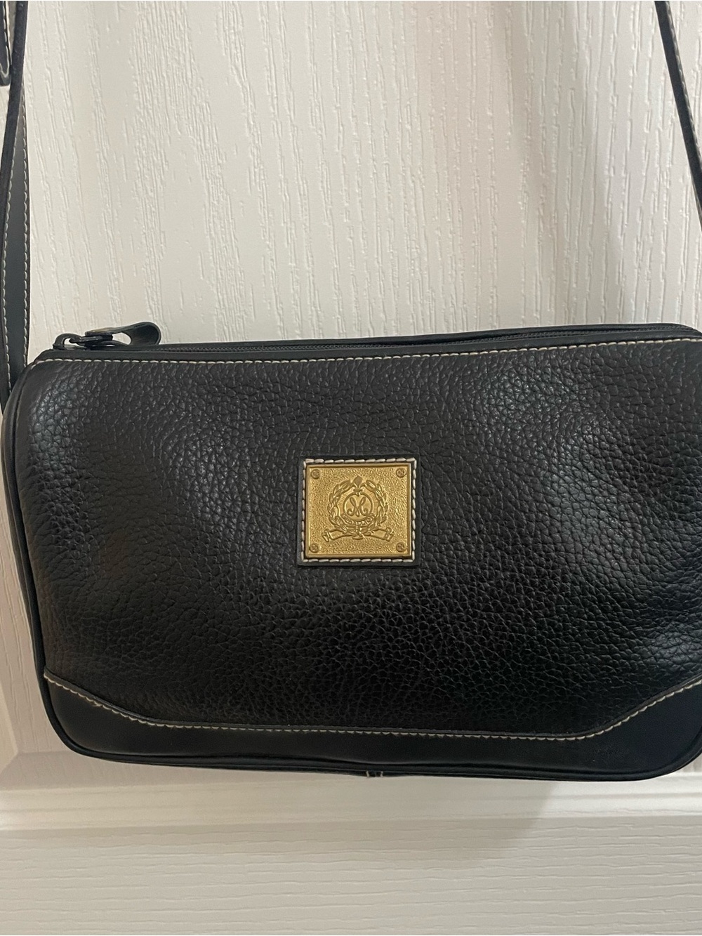 Black Leather Medallion Crossbody Bag with Gold Crest Plaque